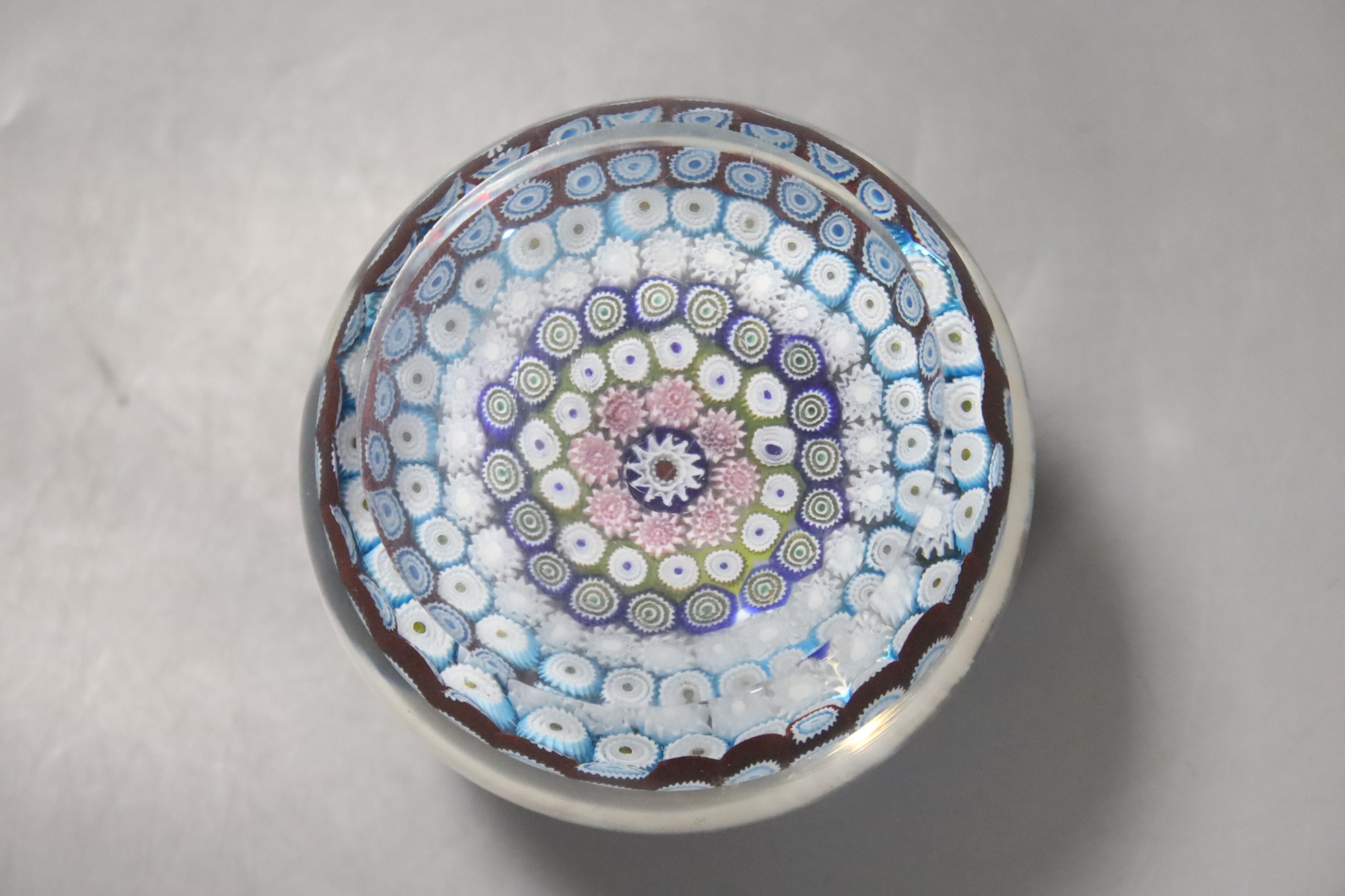 A millefiori glass magnum paperweight, 9cm.
